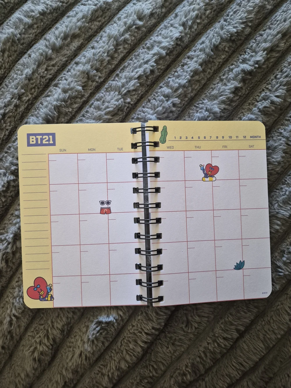 Blue Spiral Notebook with Red Heart Character 